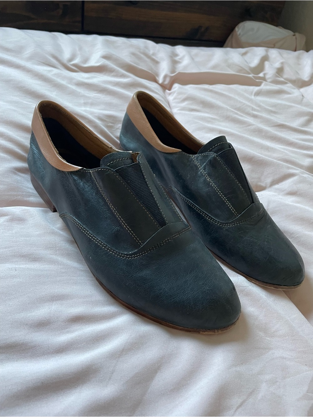 juil Slip-On Leather Flats in Charcoal Black. With Tan Accents
